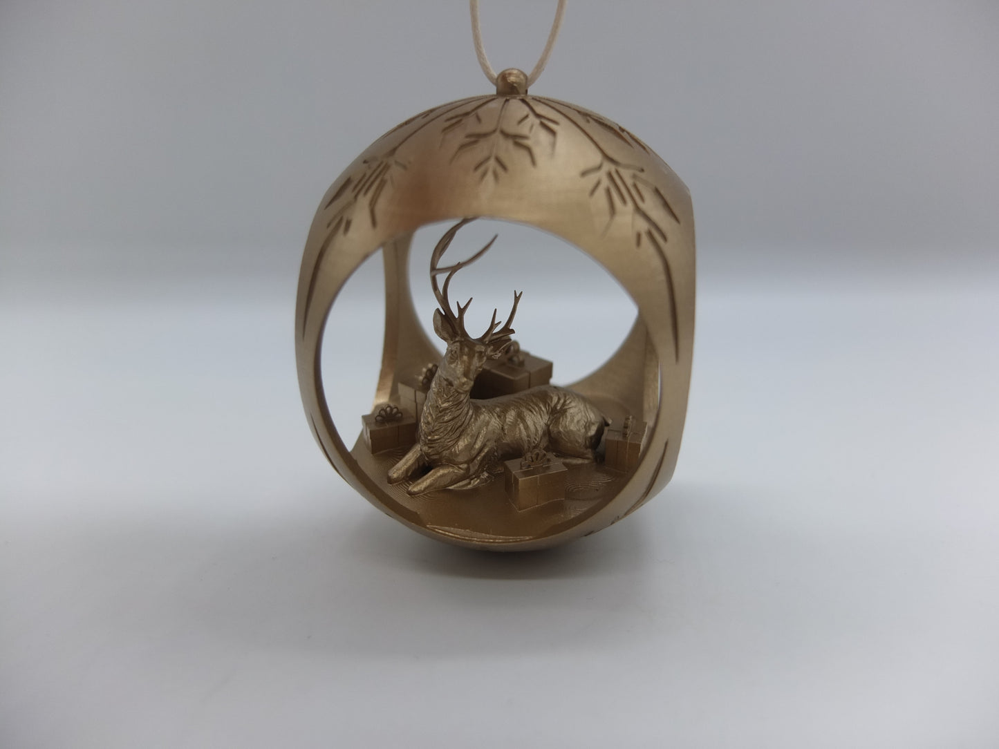 Christmas tree ball deer lying down, right antlers missing SALE